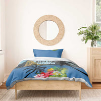 Blue duvet cover and pillow shams with palm trees, flowers, and 'Saint Lucia Caribbean'