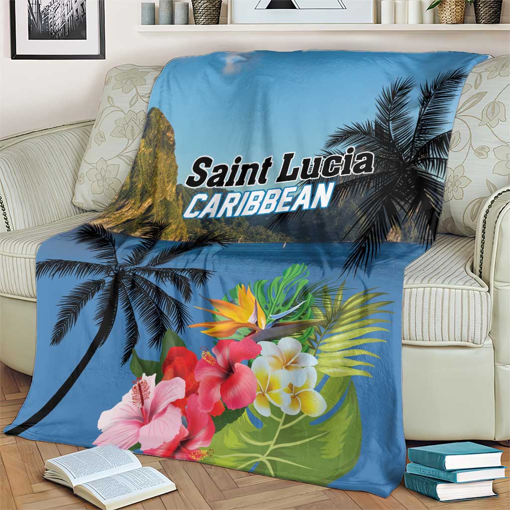 Blue tropical blanket on sofa with palm tree and hibiscus floral design and center text
