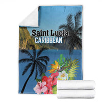 Blue tropical blanket folded with palm trees and hibiscus flowers, 'Saint Lucia Caribbean' text