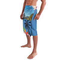 Blue lavalava skirt with palm and mountain print panel, side opening, hibiscus accents