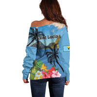 Women's blue off-shoulder sweater, back view, tropical palm and hibiscus flower print