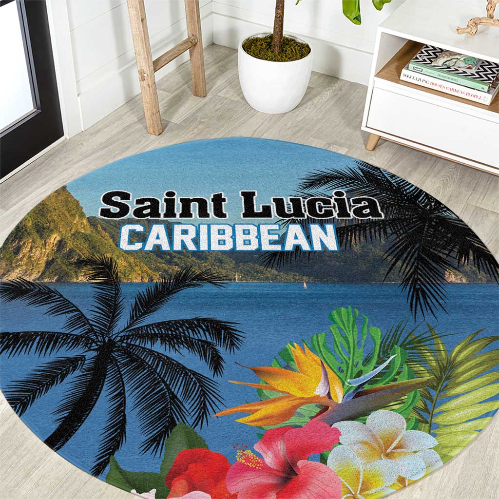 Round blue tropical area rug with hibiscus flowers and palm leaves, 'Saint Lucia Caribbean' text