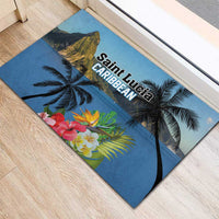 Blue rubber doormat with Caribbean lettering, mountain peak, palms, and tropical flowers