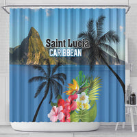 Blue shower curtain with palm trees and colorful hibiscus flowers; top grommets