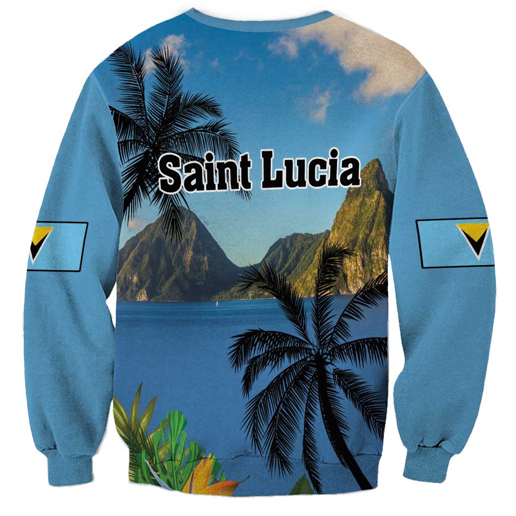 Blue sweatshirt back with palm trees and mountain by sea graphic, long sleeves with patches