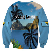 Blue sweatshirt back with palm trees and mountain by sea graphic, long sleeves with patches