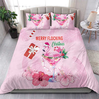 Pink Christmas bedding set with flamingo cocktail, holly, candy cane, and floral prints