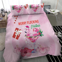 Pink Christmas bedding set with flamingo cocktail, gift box, and pink flower print