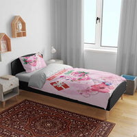 Pink Christmas bedding set with flamingo cocktail, gift box, and large pink flower artwork