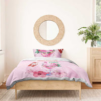 Pink Christmas duvet with flamingo cocktail, red gift bow, and pink hibiscus-style flowers