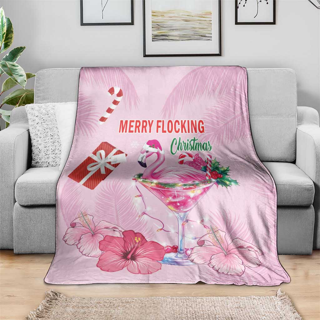 Pink Christmas throw blanket with flamingo and “MERRY FLOCKING Christmas” text