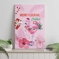 Pink flamingo holiday canvas wall art standing on shelf, “MERRY FLOCKING Christmas”