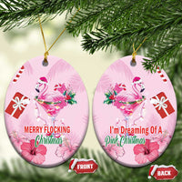 Pink flamingo Christmas ceramic oval ornaments pair with gold loops; “MERRY FLOCKING” and “I’m Dreaming…”