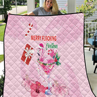 Pink Christmas quilt with diamond quilting, flamingo, gifts, and Merry Flocking text