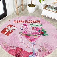 Pink round Christmas carpet with flamingo martini glass, holly, and 'MERRY FLOCKING Christmas' text