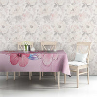 Pink Christmas tablecloth with large pink flower print on dining table