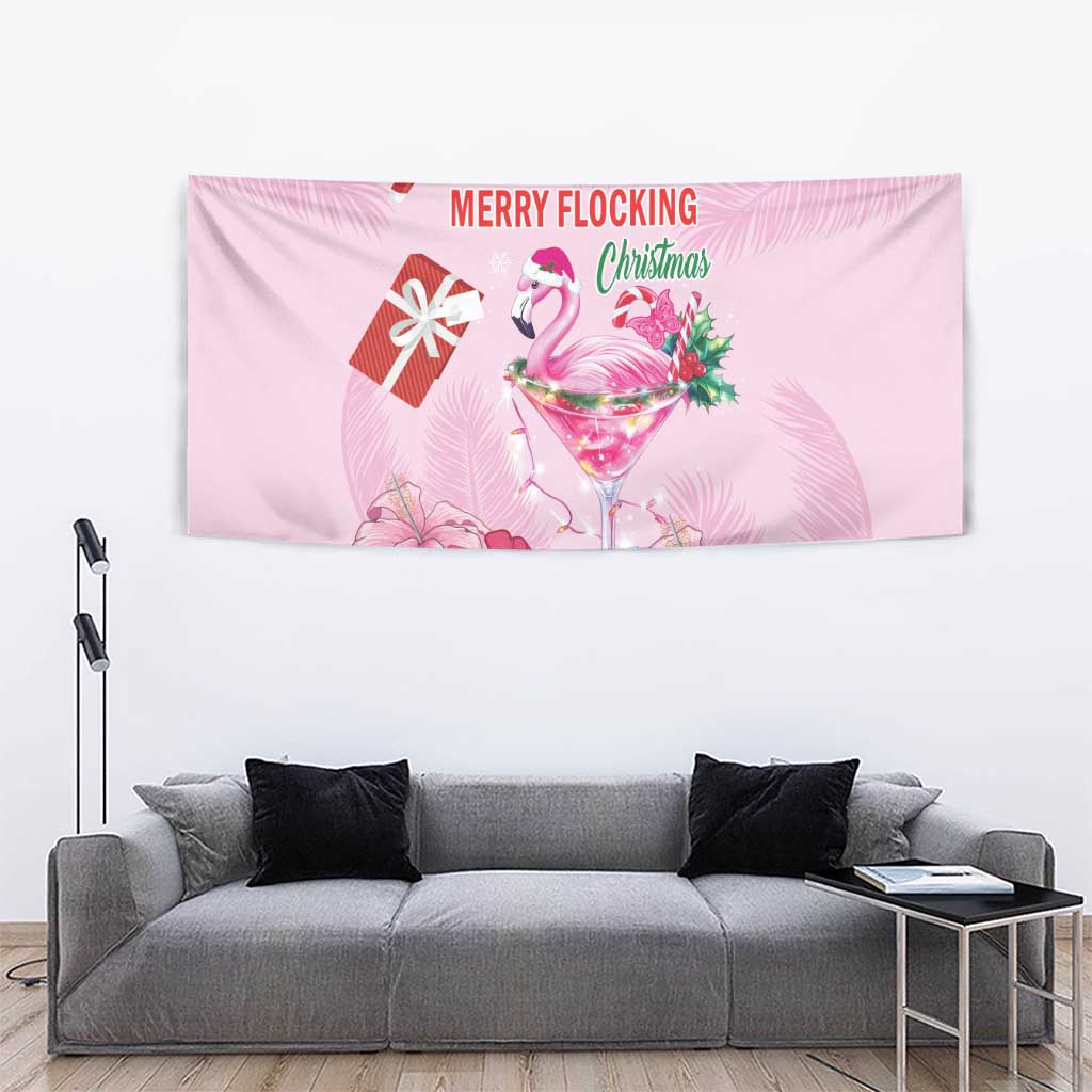 Pink Christmas wall tapestry with flamingo martini, gift icon, candy cane, and 'Merry Flocking'