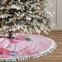 Pink round flamingo martini Christmas tree skirt with white fringe around the hem
