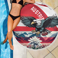 Round beach blanket with Austria text, eagle graphic, and edelweiss flower center