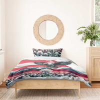 Austria eagle duvet with floral-and-mountain artwork and two pillowcases on wooden bed