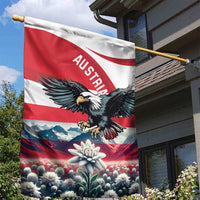 Austria garden flag on a pole with black eagle graphic and edelweiss flower