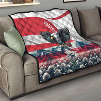 Austria flag quilt draped on a sofa with black eagle, red stripes, and flowers