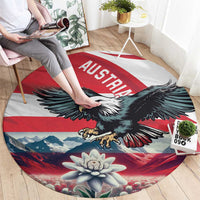 Round Austria flag carpet with black eagle, mountain and edelweiss flower design, text AUSTRIA
