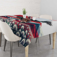 Floral tablecloth with red trim stripes and draped corners on a dining set