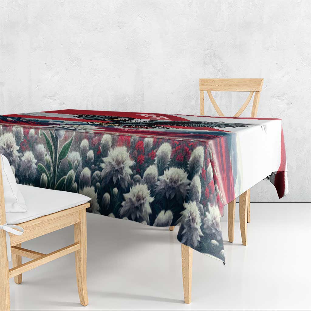 Black floral tablecloth with red striped border and hanging edges over a dining table