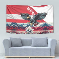 Red-and-white decorative wall tapestry with black eagle, alpine peaks, and edelweiss centerpiece