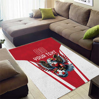 Red and white area rug with eagle holding a soccer ball and 'YOUR TEXT' center text