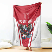 Red and white football blanket hanging like a cape, eagle mascot and soccer ball with 'YOUR TEXT'.