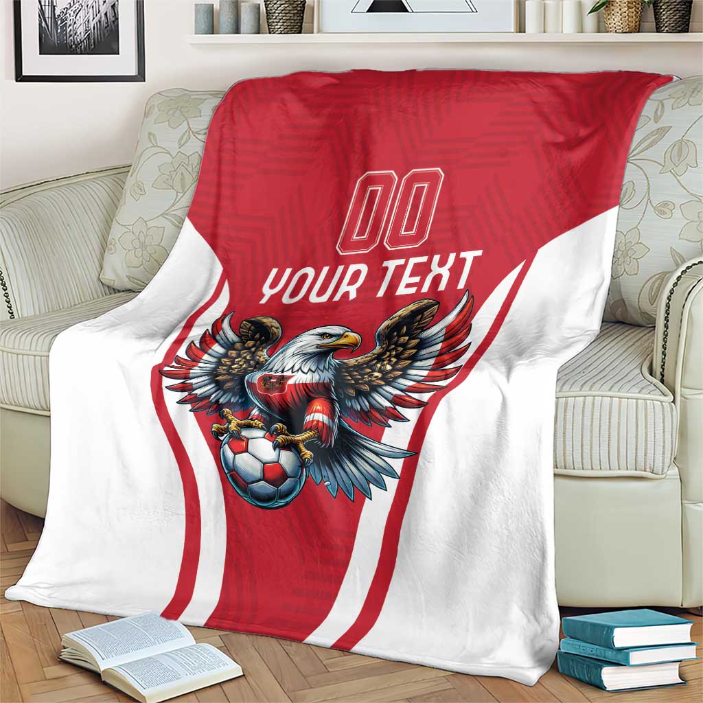 Red and white football blanket on armchair, eagle mascot with soccer ball and 'YOUR TEXT'/'00'.