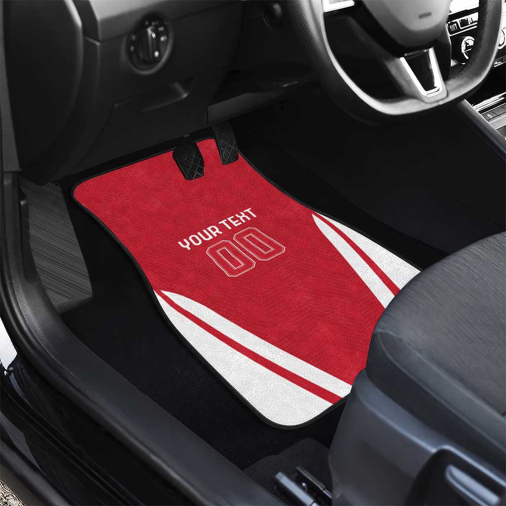 Red car floor mat with white diagonal stripes and “YOUR TEXT 00” on black trim