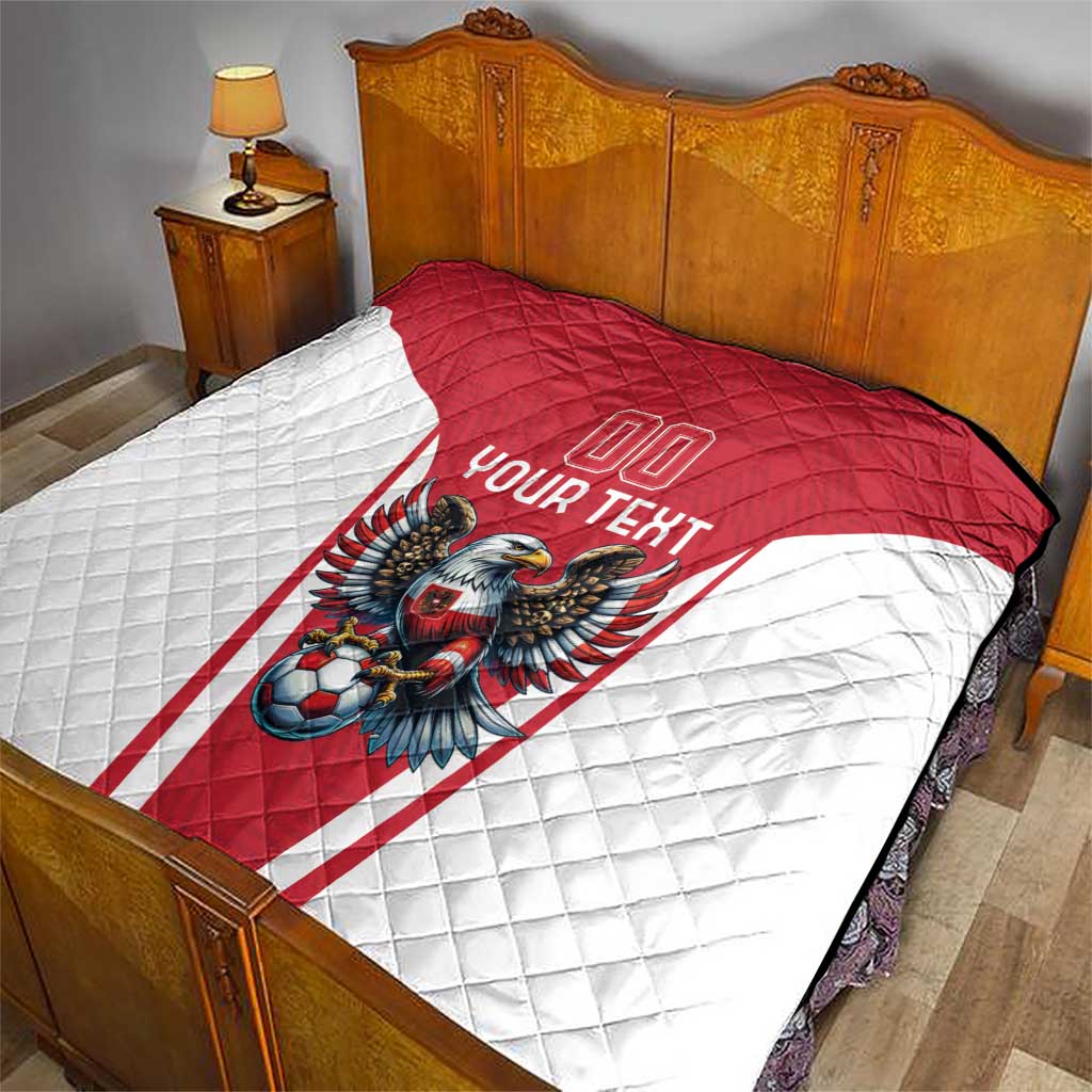 Red and white bed quilt with eagle mascot and “Your Text” over striped panel