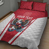 Red and white quilt bed set featuring eagle mascot over football, with two red pillows