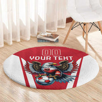 Round red football rug with eagle and soccer ball design, circular white border