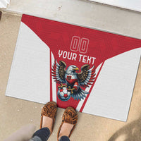 Red rubber doormat with eagle mascot, soccer ball, and 'YOUR TEXT' at center.