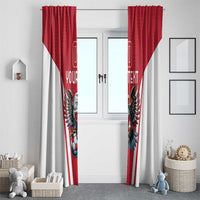 Red and white window curtains with eagle mascot print and vertical striped center