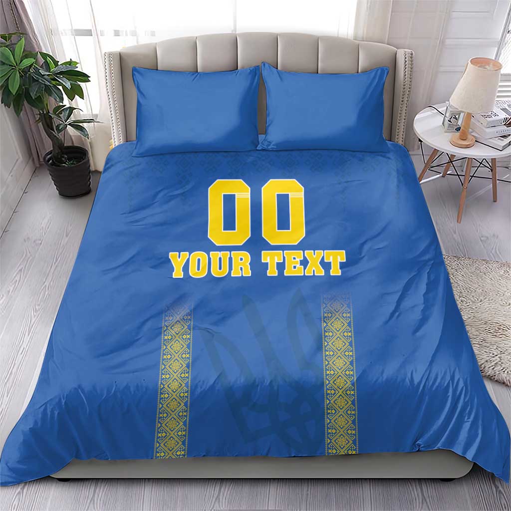 Blue football bedding set featuring '00' and 'YOUR TEXT' on duvet with two matching pillows