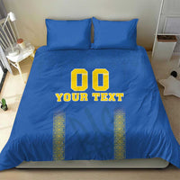 Blue football bedding set with '00' and 'YOUR TEXT' graphic on duvet and matching pillows