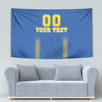 Blue football tapestry with '00 YOUR TEXT' and yellow patterned side panels, wall-hung