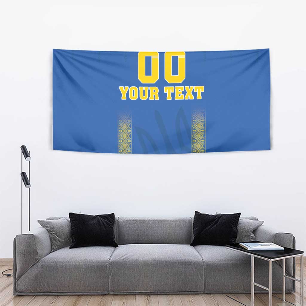 Blue football tapestry with '00 YOUR TEXT' and central dark shield, wall-hung