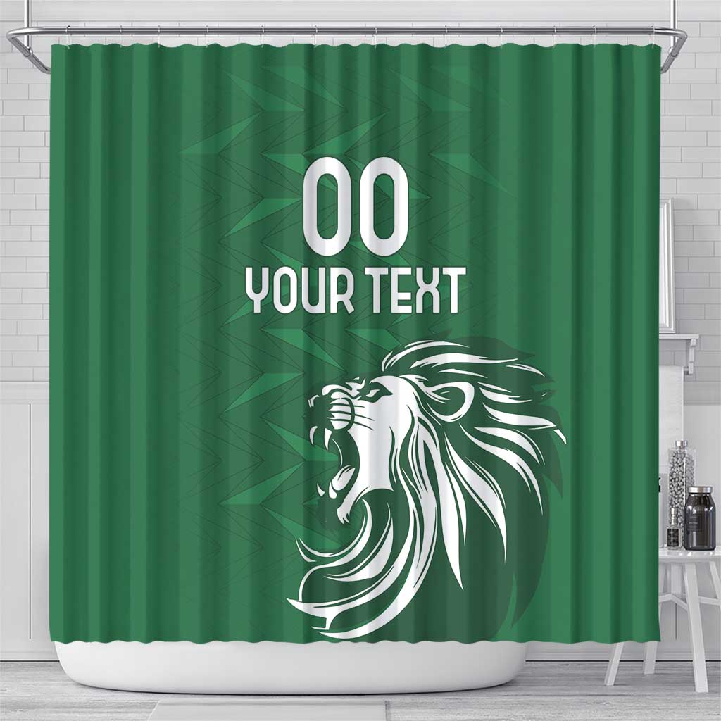 Green shower curtain with top hooks, white lion head and '00 YOUR TEXT' center
