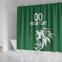 Green shower curtain with '00 YOUR TEXT' text and white lion head on front