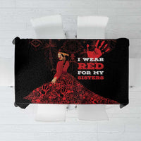 Black tablecloth with bold red graphic print and central text design