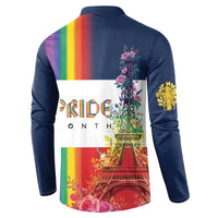 Blue henley sweatshirt back with Pride Month text, Eiffel Tower graphic, and rainbow stripe