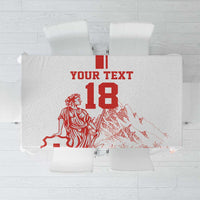 White tablecloth with red football-style graphic, 'YOUR TEXT 18', and player figures