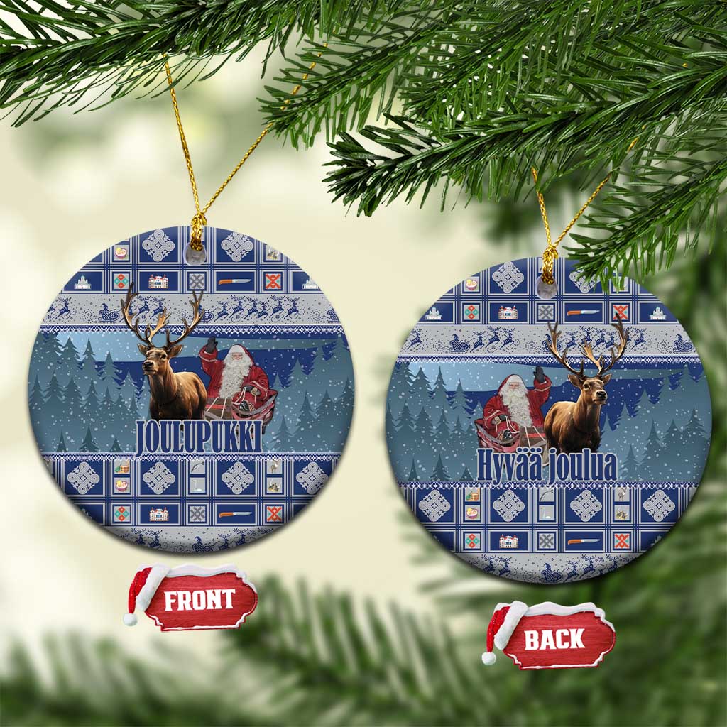 Blue ceramic round Christmas ornament with Joulupukki scene and gold hanging string