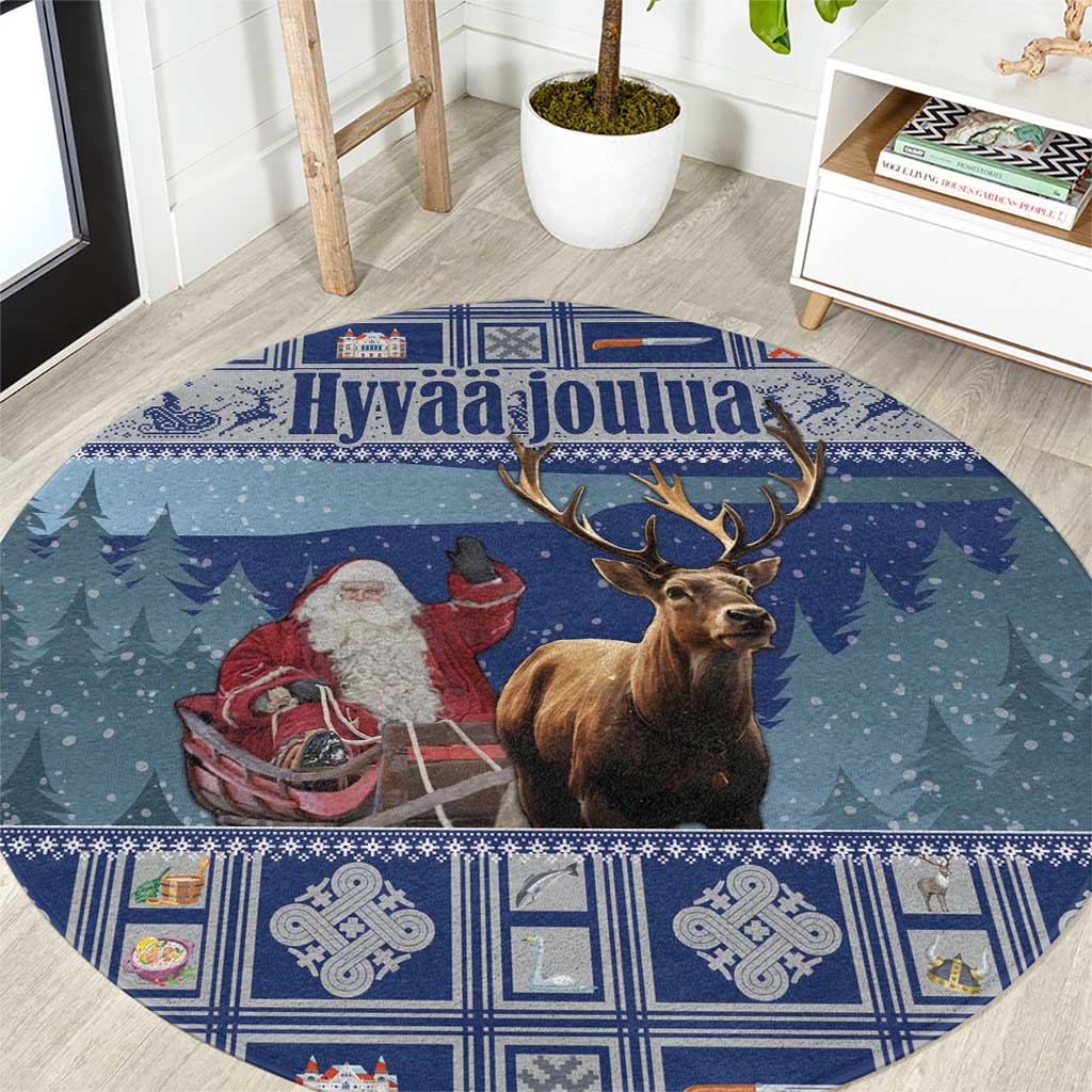 Blue round Christmas carpet with reindeer and Santa graphic in the center